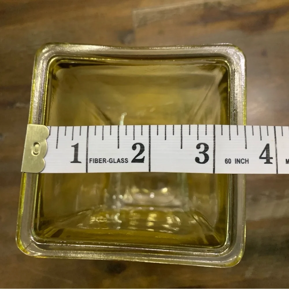 Yellow glass unique square shaped floral decorative vase. 8in tall 3.5in opening